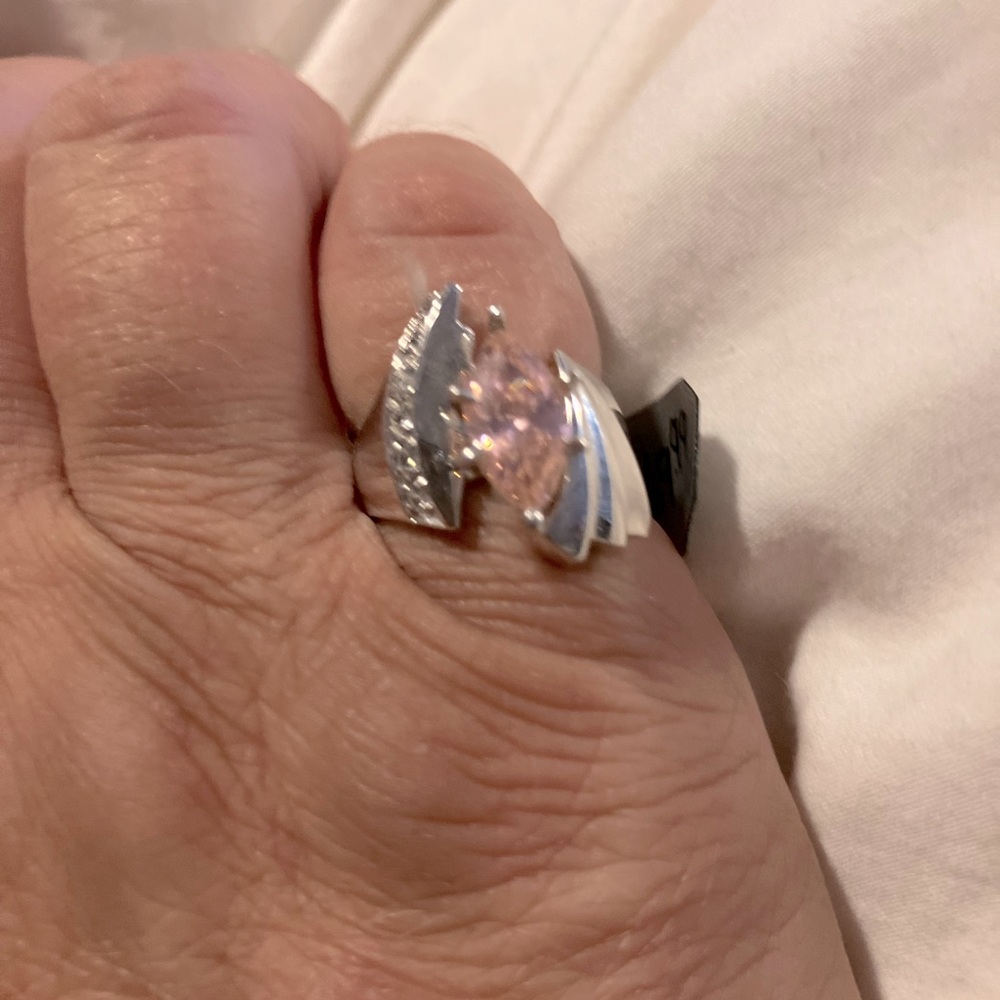 A pink AAA quality cubic zirconia pink and silver ring.